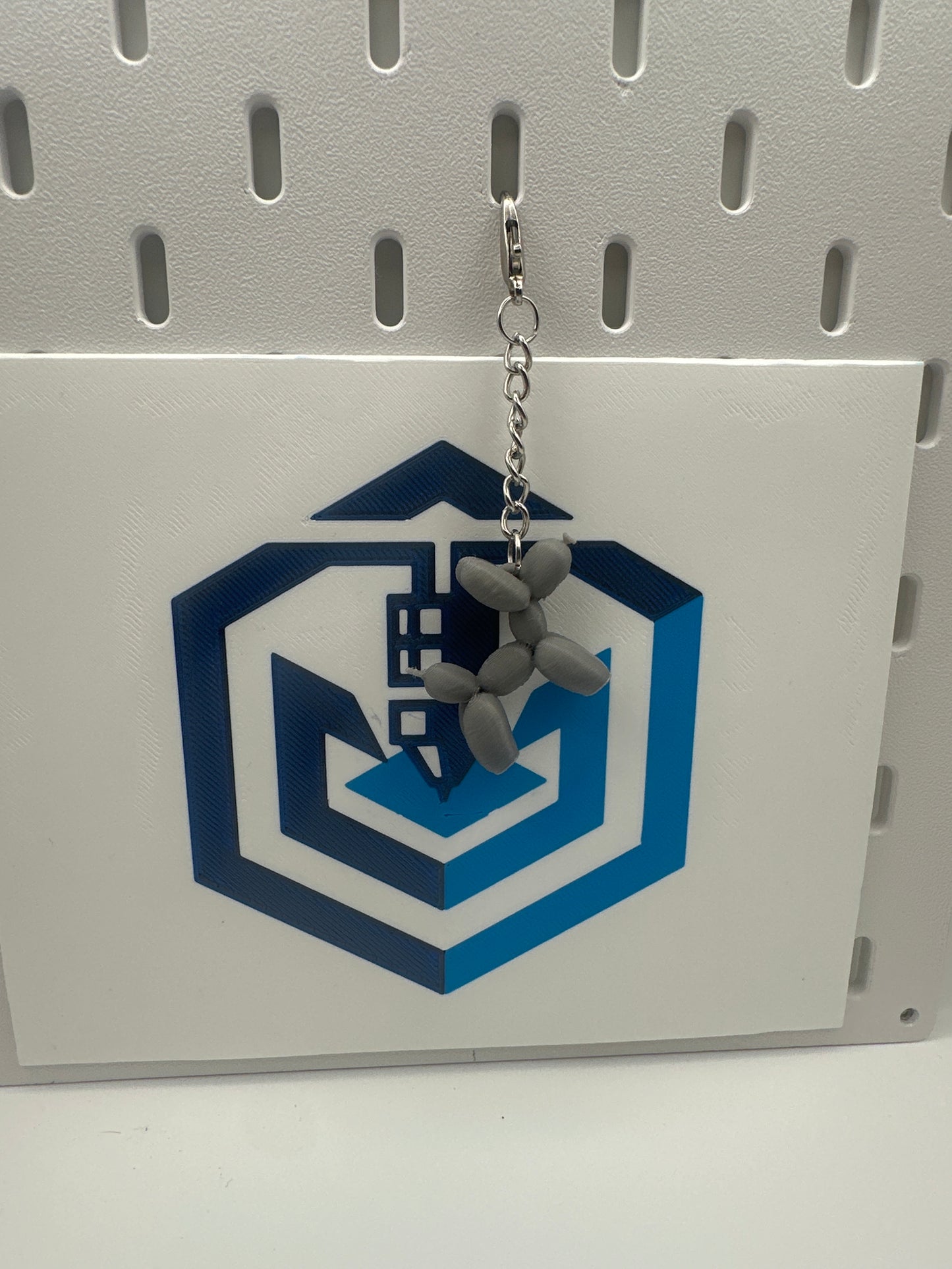 dog keychain grey
